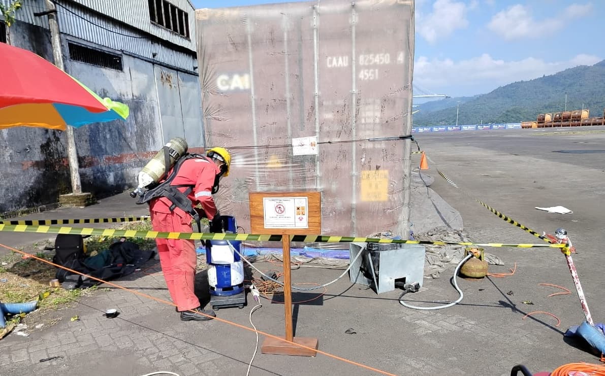 Container fumigation in progress at port before export shipment
